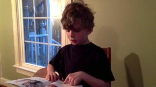 Seth reads with Dick and Jane