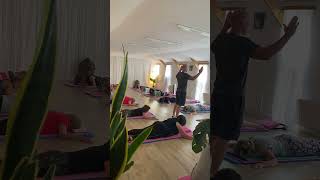 Teaching assessment as part of his pilates qualification group exercise class