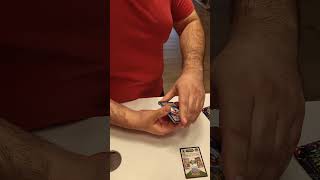 Opening a Pack of Pokemon TCG at the Nintendo store!