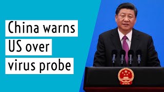 China warns US over virus probe, says WHO must work free from 'political interference'.