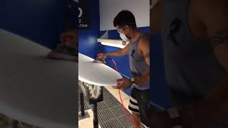 Surfboard Shaping with Foam Sandpaper