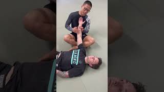 Why thumbs up to finish the armbar