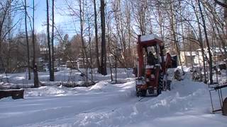 kubota l35 plowing snow