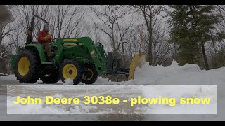 John Deere 3038e tractor - Plowing wet & heavy snow - our big house in the little woods