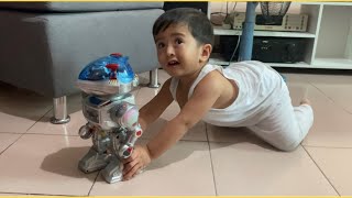 Happy Kid a Playing with His Robot Toy | Matheus Jade