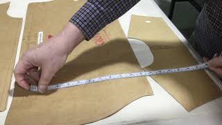 Placing pattern pieces onto fabric - laying up