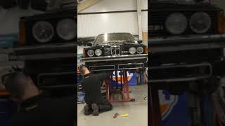 Fitting up the custom subframe and e36 front suspension set up to check ride height and fitment e21