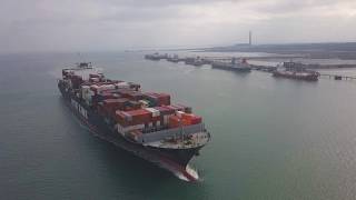 Container ship heading up Southampton water