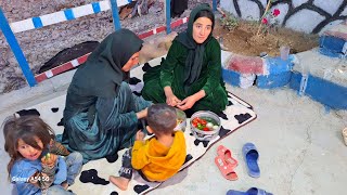 Farhanaz helping Zulfa in cooking traditional and nomadic breads in the mountains