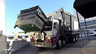 IGS Front Loader Collecting Commercial Trash