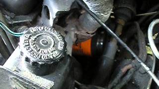 remove an oil filter with a hose clamp