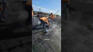 Old-school hot mopping 🔥 #shorts #roof #roofer #roofing #roofershelper #commercialroofing #flatroof