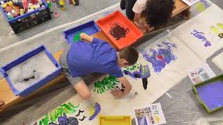 Keeping kids entertained - playing with paint - Foot and hand printing