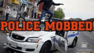 POLICE FLEE AS RESIDENTS AT A DANCE MASH UP POLICE VAN!