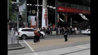 SUV driver speeds through a red light and almost hits crossing pedestrians