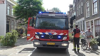 brandweer Gouda met spoed naar een gebouwbrand aan de Naaierstraat in Gouda