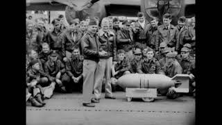 James H. Doolittle wires Japanese "peace" medals to a bomb aboard USS Hornet (CV-8), April 1942