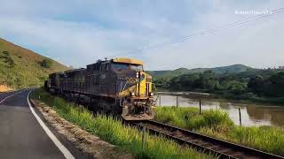 Trem de minério vazio seguindo em velocidade máxima pela linha do centro...