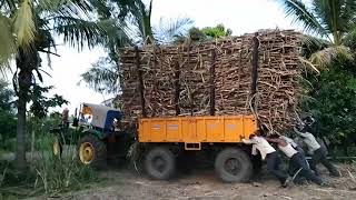 Man power💪 help tractor pulling sugarcane heavy loaded trolley John Deere tractor #india