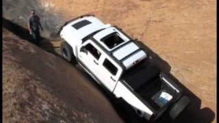 Moab-Trailbreaker Hummer H3T on Hell's Revenge Escalator