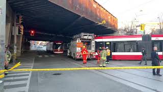 One of the TTC street cars power poll got stuck in the over head power lines and tore them 2 of 2