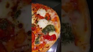 Mozzarella and vine tomatoes pizza. Simple, delicious food