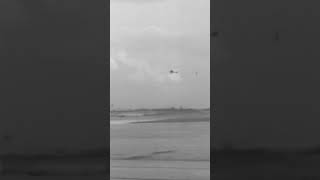 1930s Aircraft at Roosevelt Airfield with Iconic Hangars and Plane in Flight #short #shorts