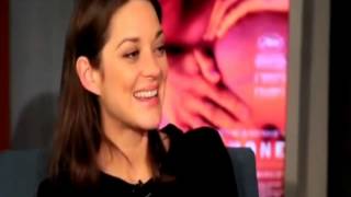 Marion Cotillard singing during interview