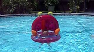 Conner Finn McAuley swimming and laughing