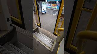 How do High-floor tram doors open at low platforms?