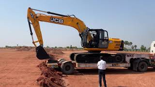 Unloading New Jcb 215 LC