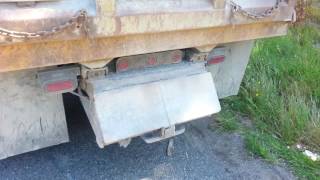 Gravel Falling From Dump Truck. State Farm Claim 478V93043