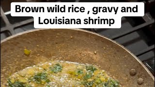 cook with me.Brown wild rice, gravy and Louisiana shrimp #fyp #viral #foodtiktok #cooking