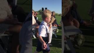 Brendan walking down the isle at Katie's wedding