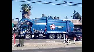 garbage truck frontloader 1345 picking up and leaving he will be back again next week