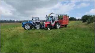 country ford 1164 and a massey ferguson kidd double chop