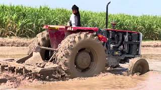 Tractor Plowing Muddy Fields