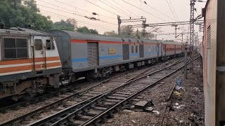 Train No. 11062 Pawan Express approaching Prayagraj with GZB WAP5 30132 and 20802 Magadh Departing