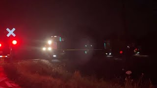 CN SD70M-2 leading a funeral train