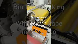 Draw tape bag on roll bin liner making machine running in Morocco