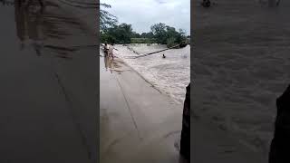 Cop rescued a guy from floods in Telangana