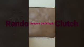 Random golf club clutch