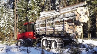 Valmet 840.3 logging in snowy winter forest, big load