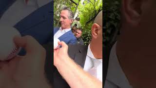 Governor Gavin Newsom SIGNS HUNDREDS OF AUTOGRAPHS HOUNDED BY FANS