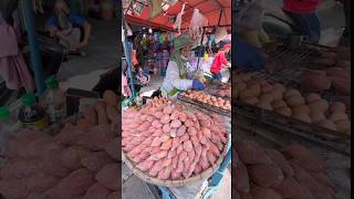 Charcoal-grilled sweet potatoes - Thai Street Food