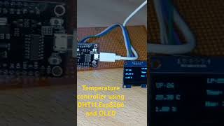 Temperature controller using dht11,esp8266 & OLED #arduino #arduinoproject #iot #esp8266 #shorts