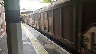 freight train passing through Otford station October 2022