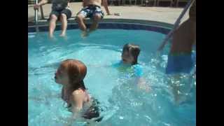 Eva jumps in pool