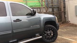 Chevy Silverado on 20" Mayhem 8103 Fierce black milled spokes wheels with 33x12.50/20 RBP tires.