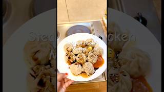 Steamed chicken momos🥟 with spicy 🥵 sauce | chicken dumplings #shorts #momos #eating  #ytshorts